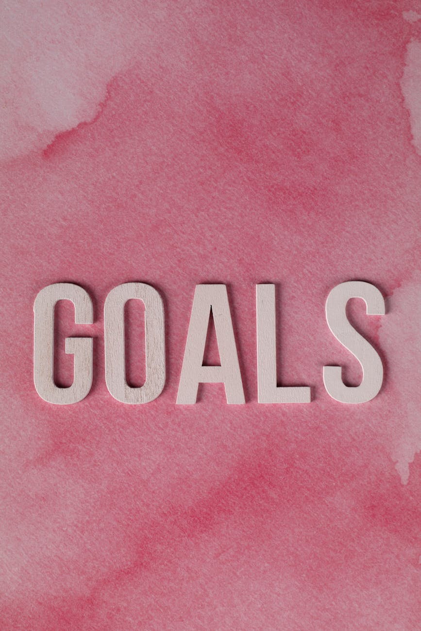 motivational pink background with goals text