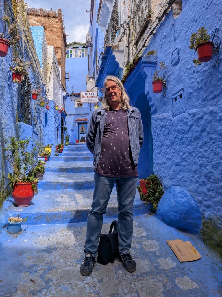 Me, dressed all in blue, on a blue paths with blue walls next to me